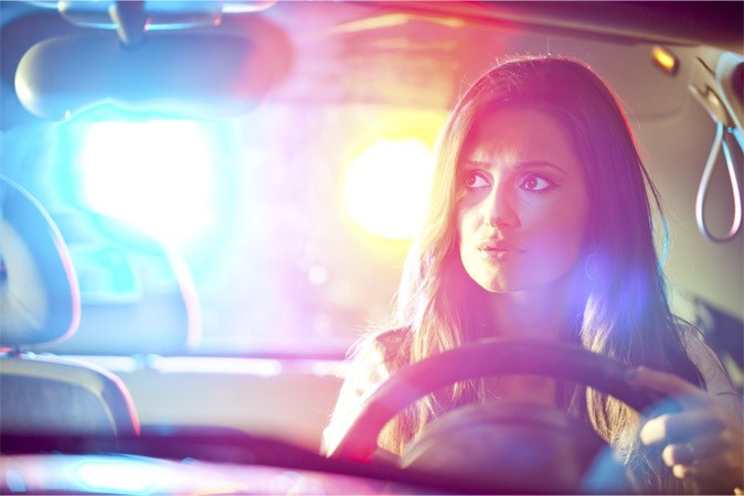 484815149-woman-pursued-by-police