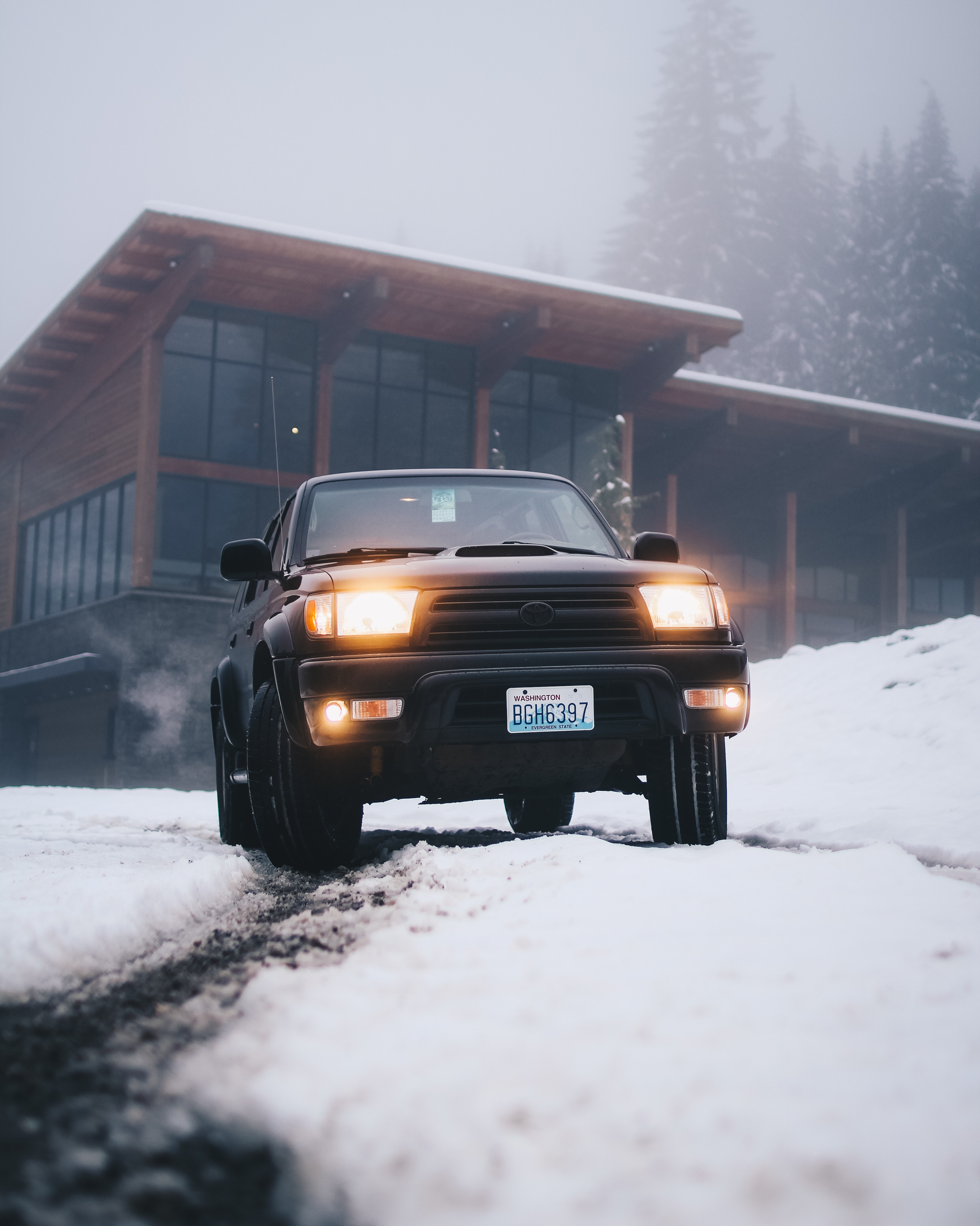 A truck driving on snow.