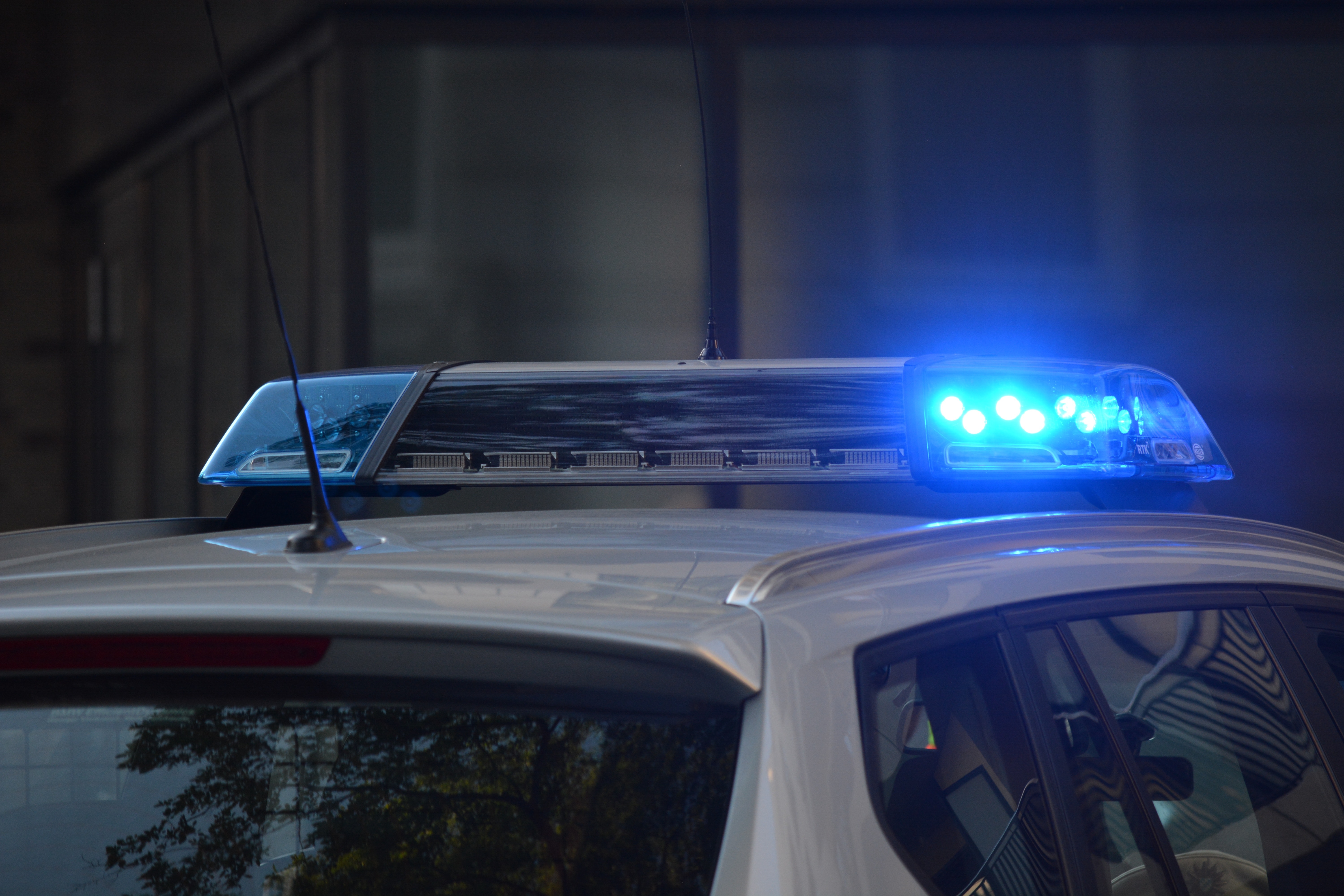 A police car siren.