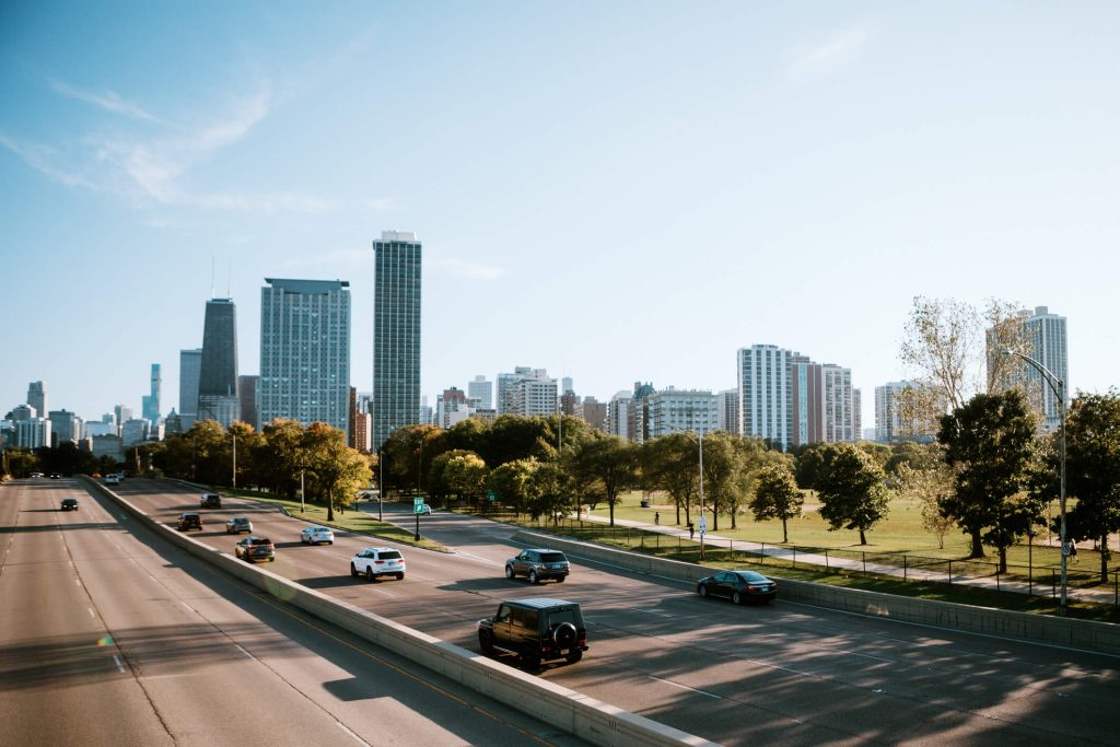 Cars driving down a highway.